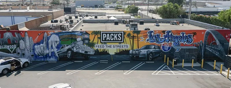 Packs large street mural in Los Angeles los angeles